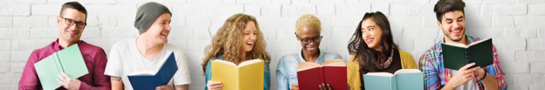 group of adults reading books